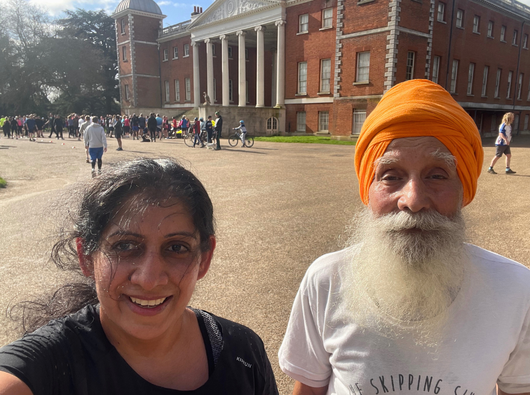 Women and man smiling