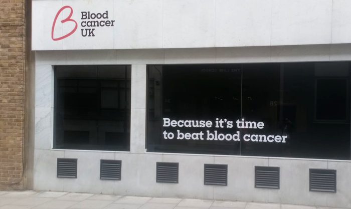 The exterior of the the old Blood Cancer UK office at Eagle Street. The exterior of the building has the writing "Because it's time to beat blood cancer".
