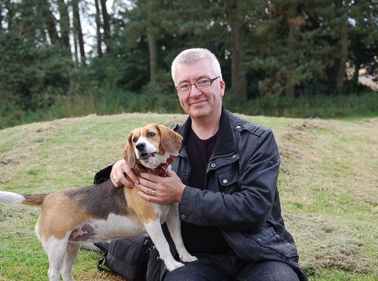 Peter, who was diagnosed with a type of blood cancer called myelodysplastic syndromes (MDS) in 2018, with his dog.