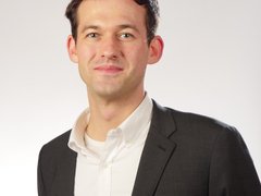 Headshot of man smiling