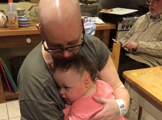 Emily and her daughter, Phoebe, on chair