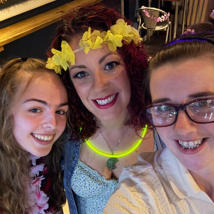 3 women smiling