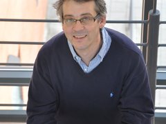 Professor Georges Lacaud stood in the lab smiling.