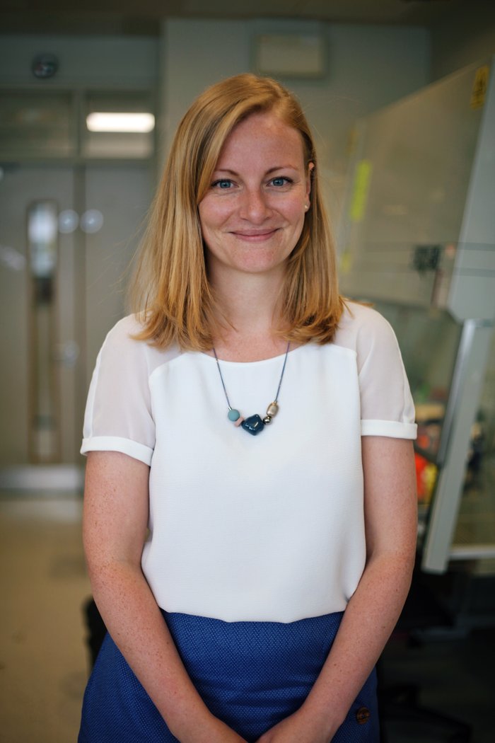 Dr Sarah Dimeloe stood smiling.
