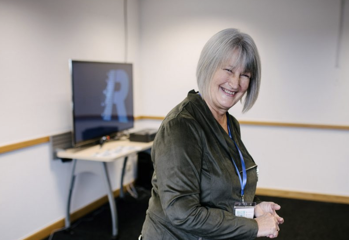 Sylvia who's husband, Tony, was diagnosed with acute lymphoblastic leukaemia (ALL) smiling at the camera.