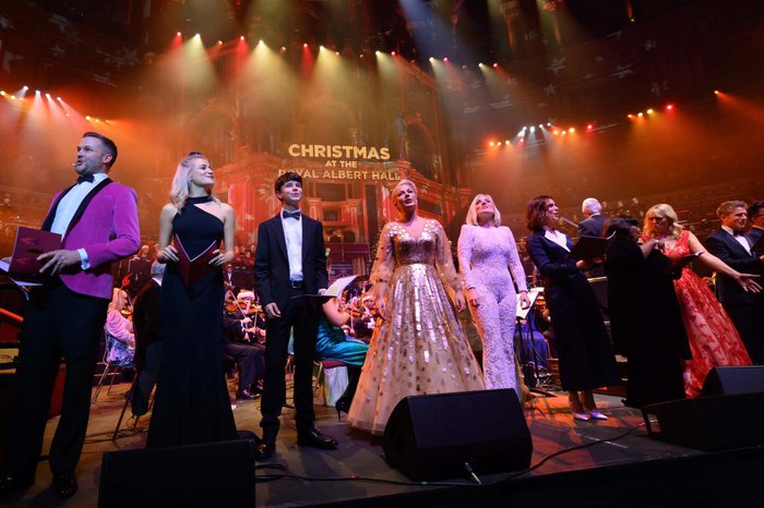 Celebritiies on stage at the Royal Albert Hall, with a sign in the background saying 'Christmas at the Royal Albert Hall' during a performance of Christmas with the Stars.